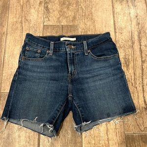 Levi’s mid length jean shorts